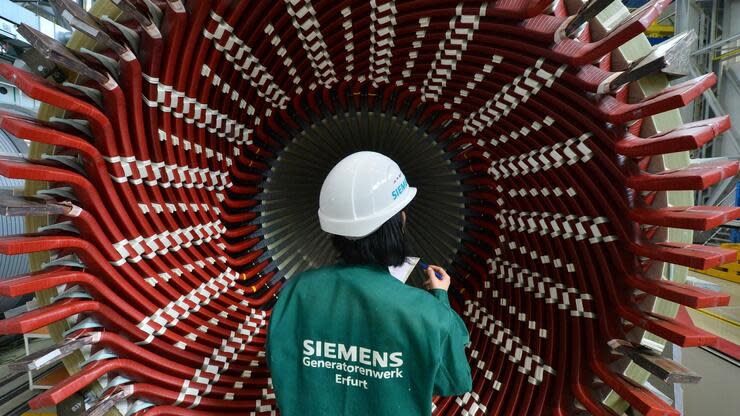 Mit Abstand die meisten Aktionäre hat Siemens: 305.000 der gut 380.000 Mitarbeiter halten Firmenaktien. Foto: dpa