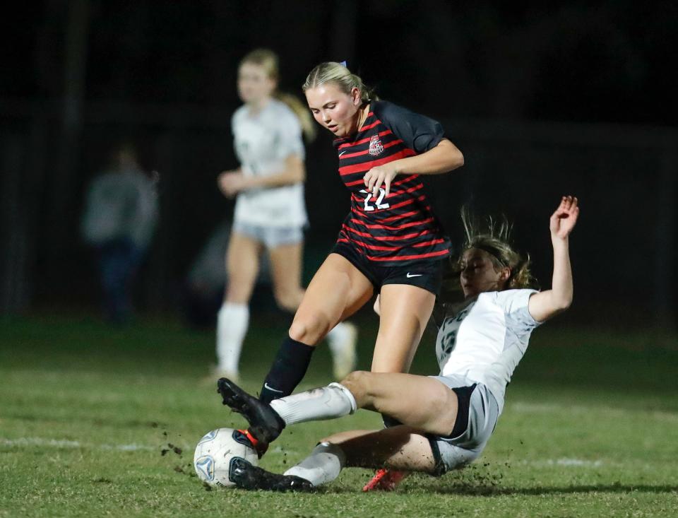 New Smyrna Skya Horth (22) battles with Flagler Palm Coast's Heidi Michaels (13) during a match at Ormond Sports Complex, Tuesday, Jan. 16, 2024.