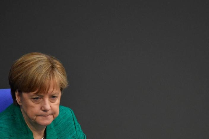 Will the divisions over migration split Germany conservative coalition and spell an end of the line for Chancellor Angela Merkel? (AFP Photo/John MACDOUGALL)