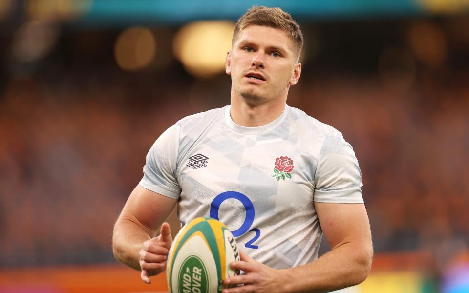 Owen Farrell of England runs during the warm-up  - GETTY IMAGES