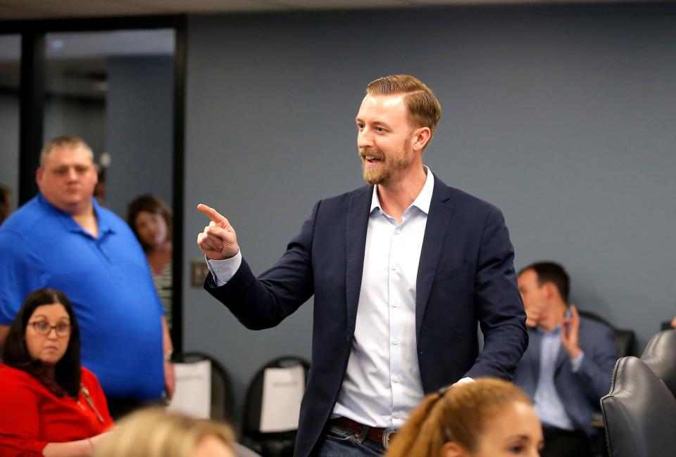 Ryan Walters, state schools superintendent, greets the crowd Thursday before a meeting with the Oklahoma State Board of Education in Oklahoma City.