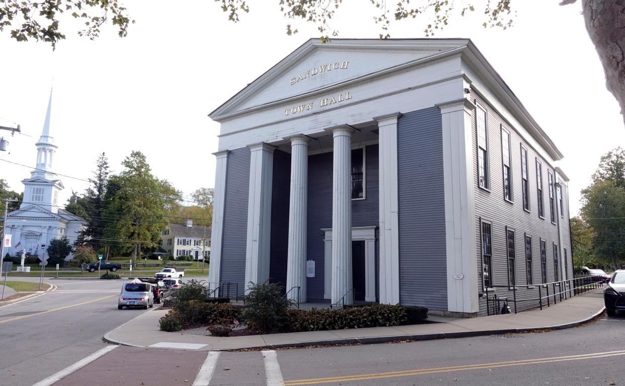 The old Sandwich Town Hall, at the corner of Grove and Main streets in the center of the village, dates back to 1834. The oldest town hall on the Cape, it is being replaced with a new town hall at a former bank branch.