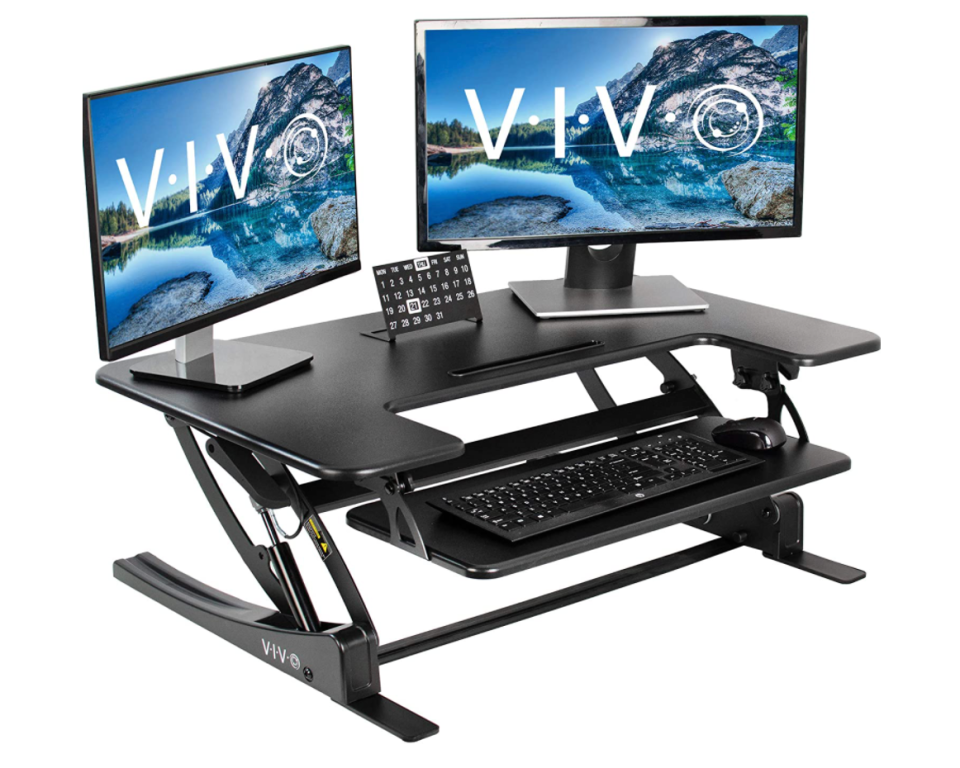 VIVO Height-Adjustable Stand-Up Desk Converter in 36 Inches (Photo via Amazon)