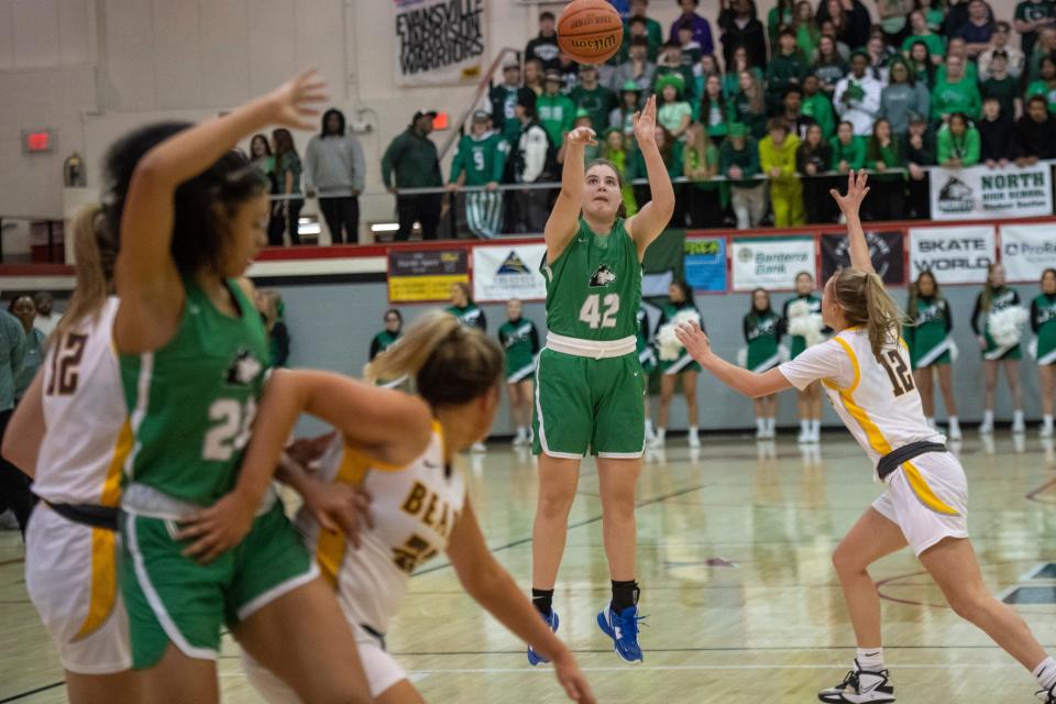 North’s Libby Blythe (42) takes a shot as the Central Bears play the North Huskies during the semifinal round of the 2023 IHSAA Class 4A Girls Basketball Sectional at Harrison High School in Evansville, Ind., Friday, Feb. 3, 2023. 