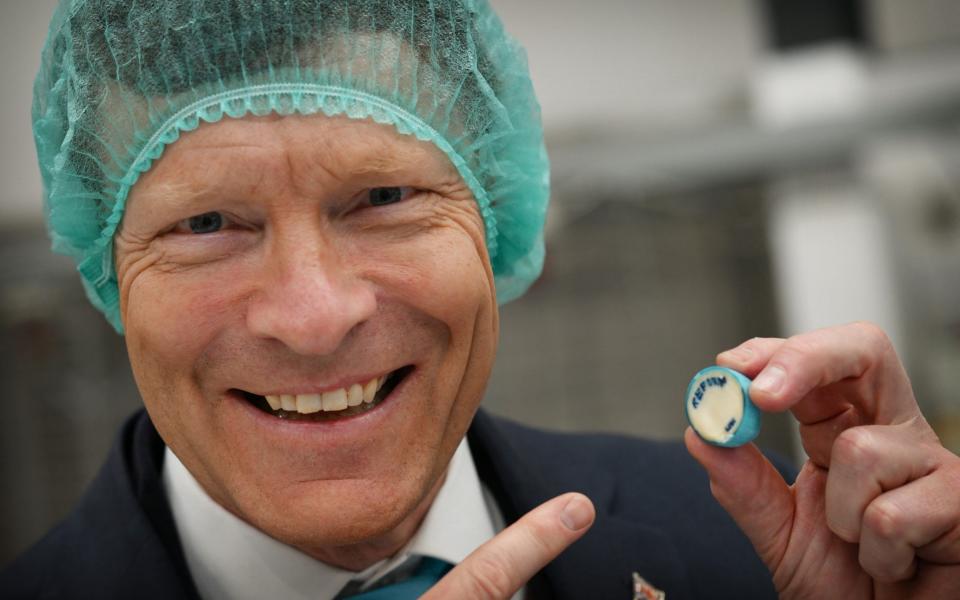 Richard Tice, the leader of Reform UK, poses with some specially-made "Reform" rock during a campaign visit to Blackpool ahead of the Blackpool South by-election on May 2