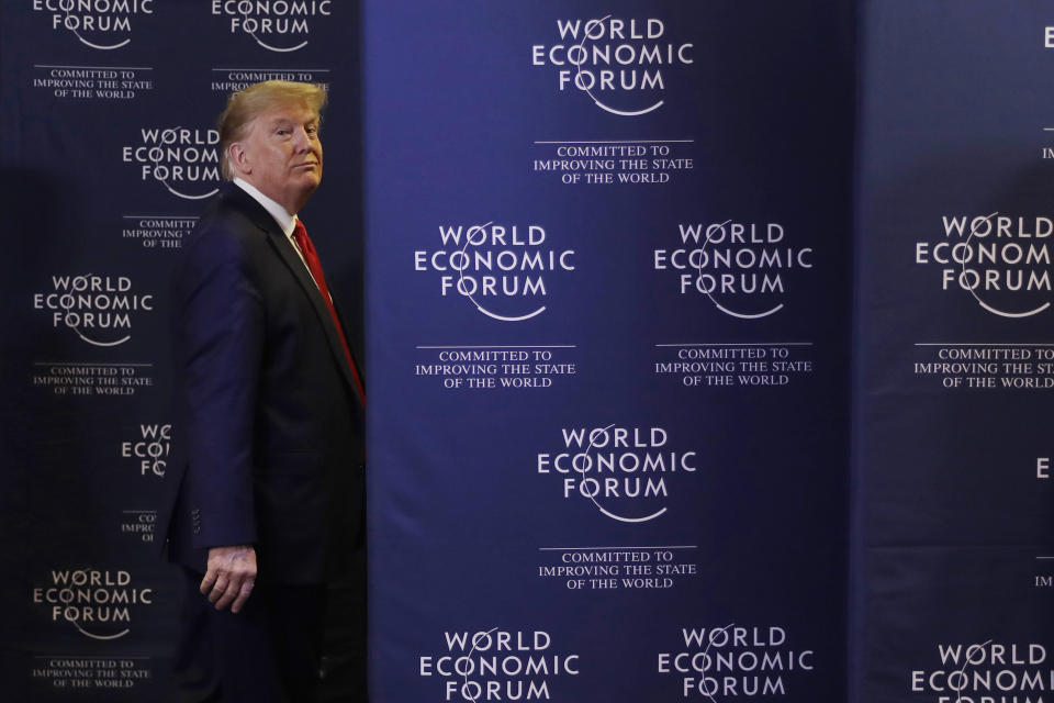 FILE - In this Jan. 22, 2020, file photo, President Donald Trump leaves after a news conference at the World Economic Forum in Davos, Switzerland. It's been a week packed with rhetoric from President Donald Trump. This, as his Senate impeachment trial unfolded and the economic forum in Davos, Switzerland, played out. An AP Fact Check put his statements under scrutiny and found distortions on a range of topics. (AP Photo/Evan Vucci, File)