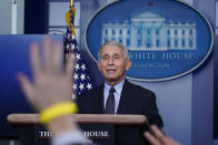 Dr. Anthony Fauci, director of the National Institute of Allergy and Infectious Diseases, takes questions as he speaks with reporters in the James Brady Press Briefing Room at the White House, Thursday, Jan. 21, 2021, in Washington. (AP Photo/Alex Brandon)