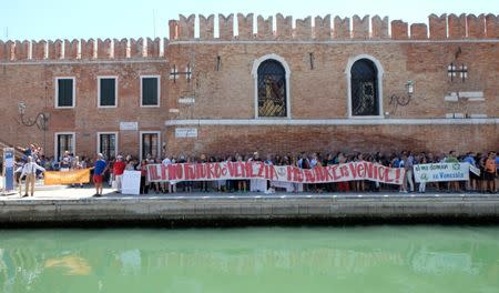 Venice's residents holds a banner " My future is Venice" during a protest in Venice, Italy, July 2, 2017. Picture taken on July 2, 2017REUTERS/Manuel Silvestri