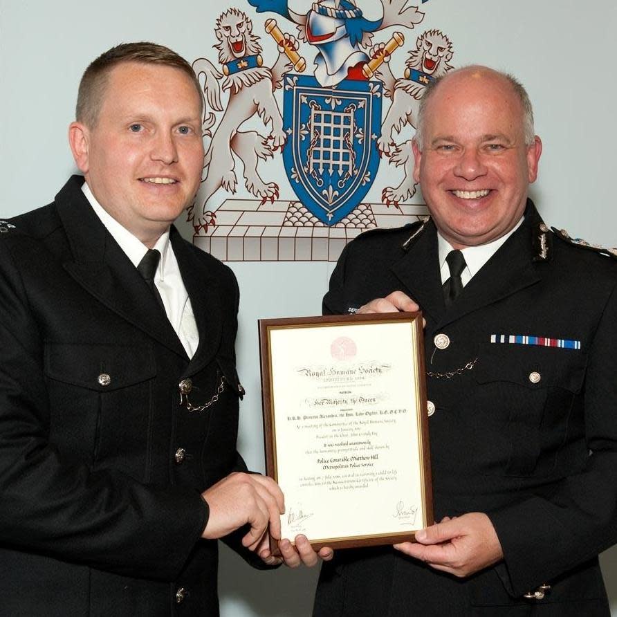 PC Matthew Hill with proud Deputy Commissioner Craig Mackey. (Met Police)