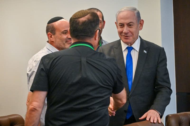 Prime Minister of Israel Benjamin Netanyahu (R) meets with representatives of hostages' families and bereaved families from the Heroism forum and the Hope forum, at the Prime Minister's Office in Jerusalem. Kobi Gideon/GPO/dpa