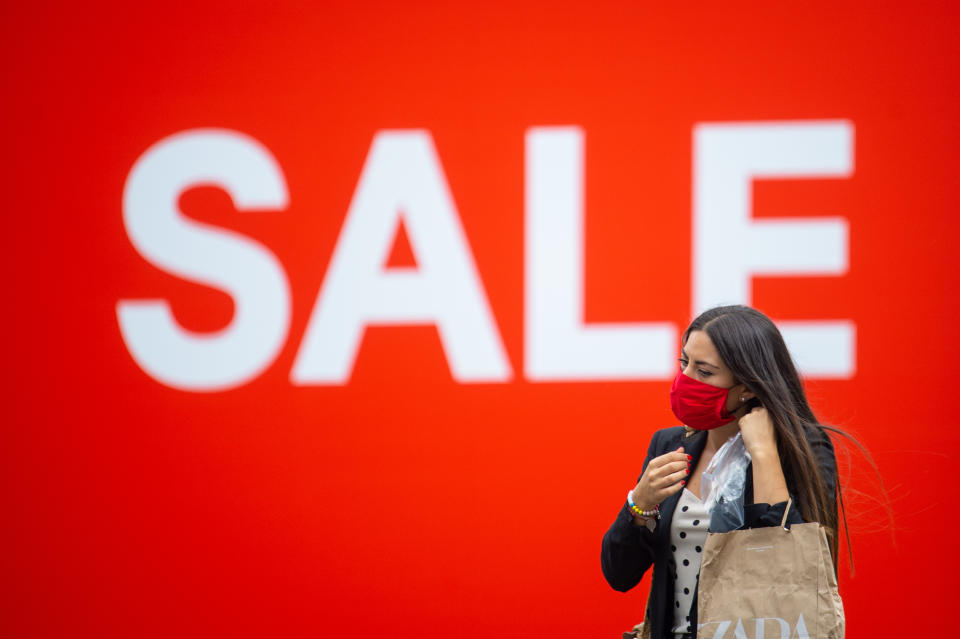 A shopper wearing a face covering on Oxford Street, London, ahead of the announcement that it will soon be mandatory to wear a face covering in shops in England.