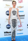 Celebrities in monochrome fashion: Miley Cyrus failed to impress in this <a href="http://uk.lifestyle.yahoo.com/photos/celebrities-metallic-fashion-trend-clothes-outfit-style-slideshow/" data-ylk="slk:monochrome;elm:context_link;itc:0;sec:content-canvas;outcm:mb_qualified_link;_E:mb_qualified_link;ct:story;" class="link  yahoo-link">monochrome</a> Balmain SS13 jumpsuit at the Billboard Music Awards 2013.