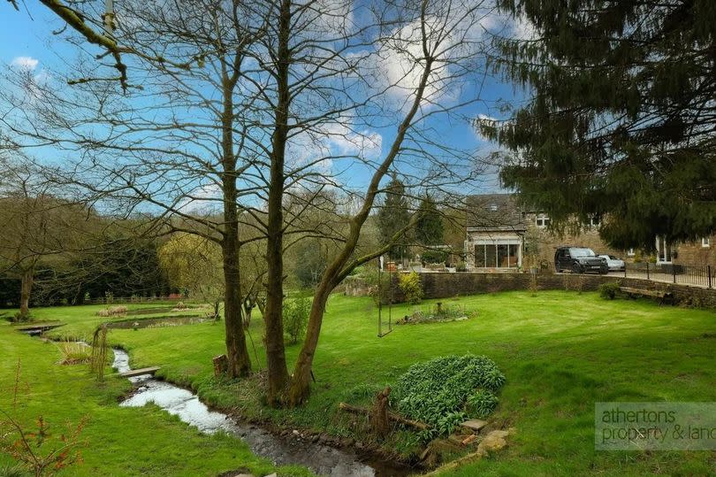 Beautiful gardens surround the home -Credit:Athertons / Zoopla