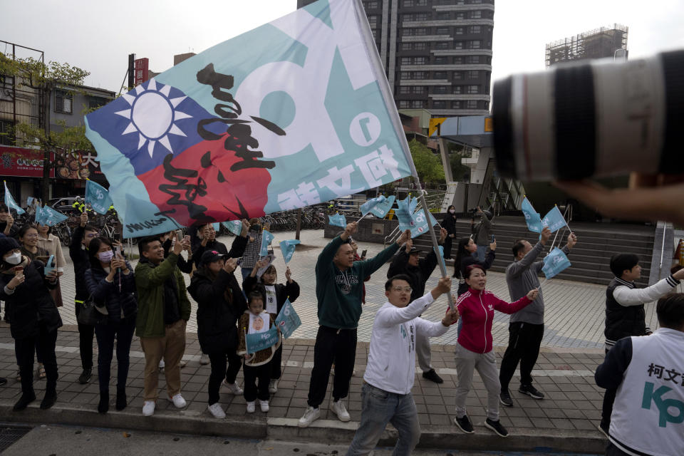 Supporters of Ko Wen-je, Taiwan People's Party (TPP) presidential candidate, cheer as he canvass a neighbourhood in New Taipei City, Taiwan on Wednesday, Jan. 10, 2024. With Taiwan's high-stakes presidential election just days away, the nonconformist candidate has been resonating with the island's youth, seemingly more concerned with the dearth of good jobs and affordable housing than the looming threat from China. (AP Photo/Ng Han Guan)