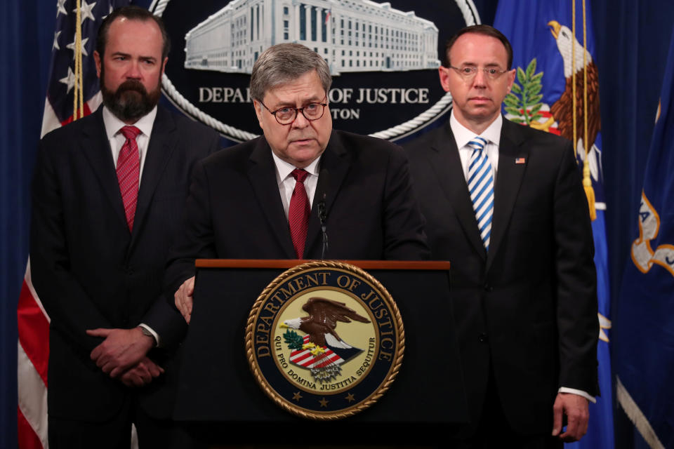 U.S. Attorney General William Barr, flanked by Acting Principal Associate Deputy Attorney General Edward O'Callaghan and Deputy Attorney General Rod Rosenstein, speaks at a news conference to discuss Special Counsel Robert Mueller's report on Russian interference in the 2016 U.S. presidential race, in Washington, U.S., April 18, 2019. REUTERS/Jonathan Ernst