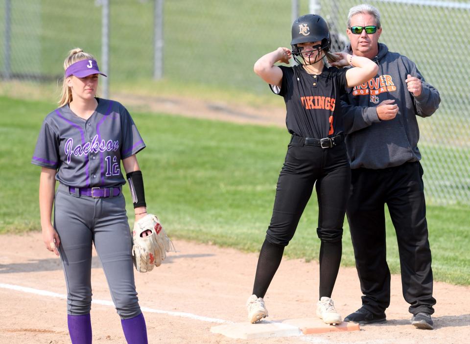 Hoover's Delany Shannon singles against Jackson in the first inning of the Division I district final in Massillon, Wednesday, May 17, 2023.