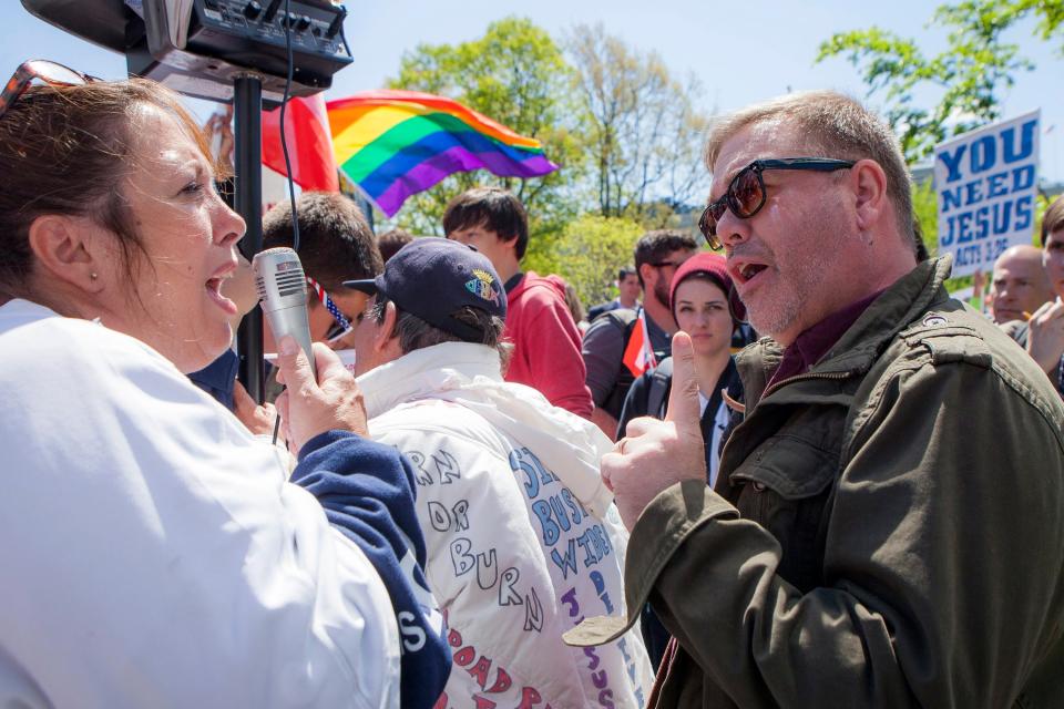 In April 2015, the Rev. Scott Hopkins, right, of United Methodist Church in Vienna, Va, voiced support of gay marriage as Tracy Grisham, of Amarillo, Texas, shouted her disapproval in front of the U.S. Supreme Court building.