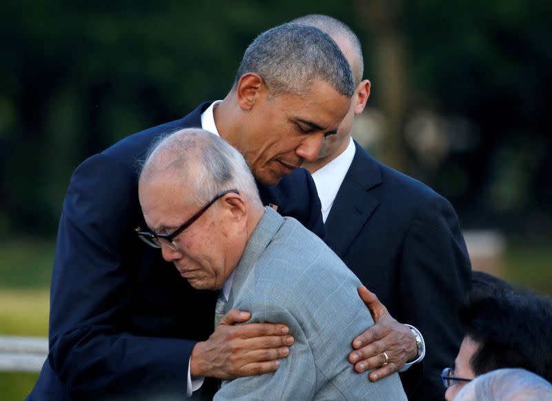 FILE PHOTO: U.S. President Barack Obama hugs atomic bomb survivor Shigeaki Mori as he visits Hiroshima Peace Memorial Park in Hiroshima