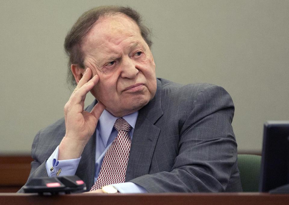 FILE - In this April 5, 2013, file photo, Las Vegas Sands Corp. CEO Sheldon Adelson testifies in Clark County district court in Las Vegas. A Nevada gambling regulator says the hackers who knocked down all Las Vegas Sands websites, Feb. 10, 2014, for two days and counting did not steal any patron data, including credit card information. (AP Photo/Julie Jacobson, File)