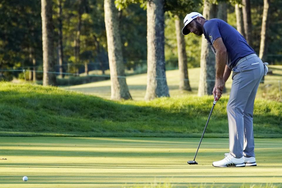 Dustin Johnson watches his birdie putt on the 17th hole during the third round of the Northern Trust golf tournament at TPC Boston, Saturday, Aug. 22, 2020, in Norton, Mass. (AP Photo/Charles Krupa)