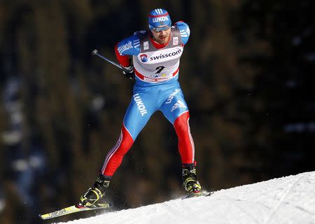 Alexey Petukhov of Russia skis to win the men's cross country individual 1500m sprint free finals at the FIS World Cup in Davos, December 11, 2011. REUTERS/Christian Hartmann