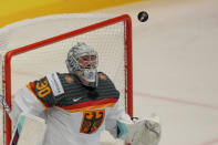 Germany's goalkeeper Philipp Grubauer makes a save during the preliminary round match between Slovakia and Germany at the Ice Hockey World Championships in Ostrava, Czech Republic, Friday, May 10, 2024. (AP Photo/Darko Vojinovic)