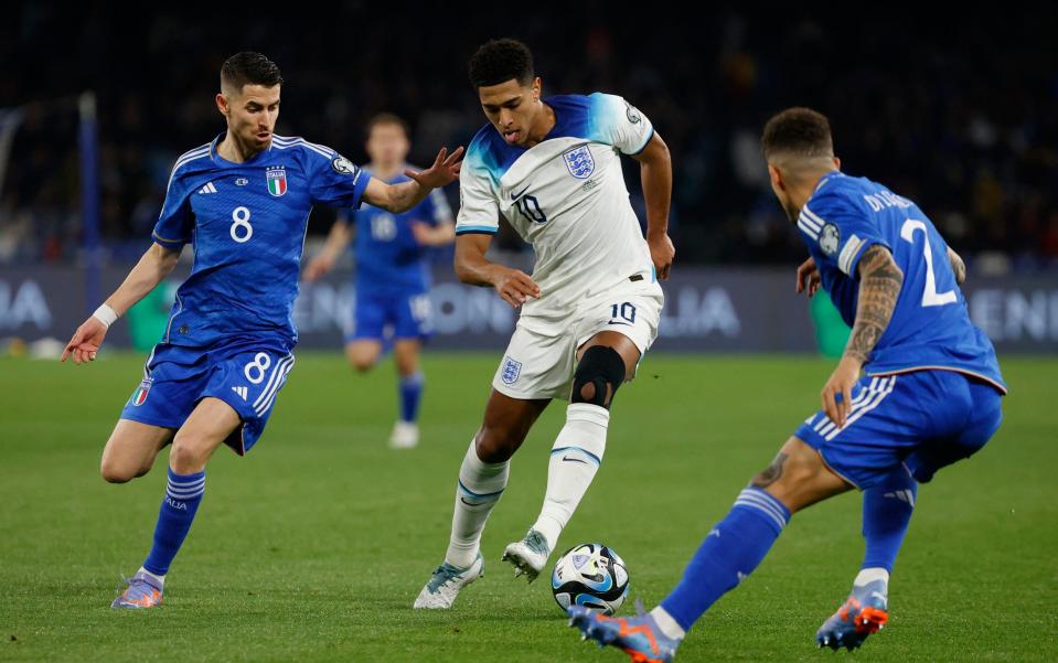 England's Jude Bellingham in action with Italy's Jorginho - Italy vs England player ratings: Jude Bellingham imperious but Harry Maguire caught out - Reuters/Ciro De Luca
