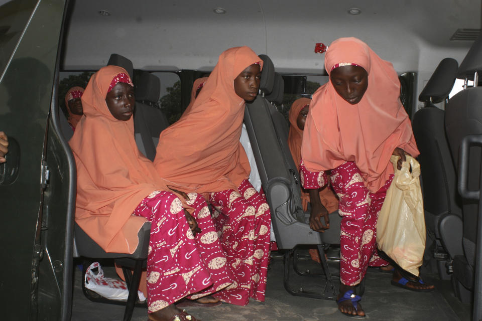 The freed students of the LEA Primary and Secondary School Kuriga upon their arrival at the state government house in Kaduna, Nigeria, Monday, March 25, 2024. More than 130 Nigerian schoolchildren rescued after more than two weeks in captivity have arrived in their home state in northwestern Nigeria ahead of their anticipated reunions with families. (AP Photo/Olalekan Richard)