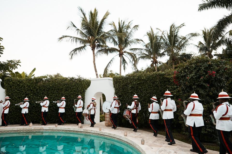 The police band marched around the pool before leading guests into dinner in the garden.