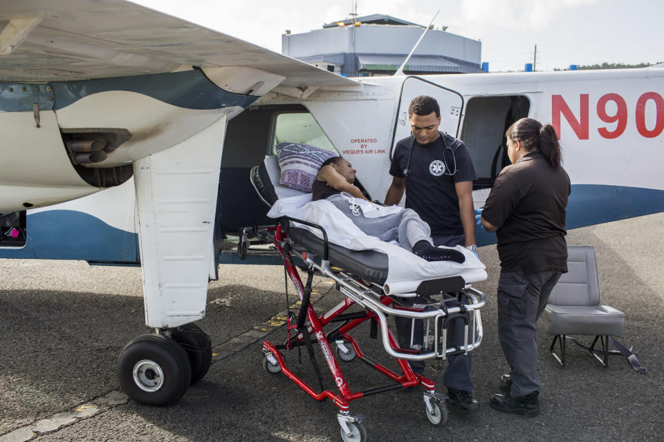 At the Vieques airport, Sandra&nbsp;Medina de Jes&uacute;s is transferred in a small aircraft for her dialysis treatment at the&nbsp;Fresenius Kidney Care Center in Humacao, Puerto Rico. (Photo: Dennis M. Rivera Pichardo for HuffPost)