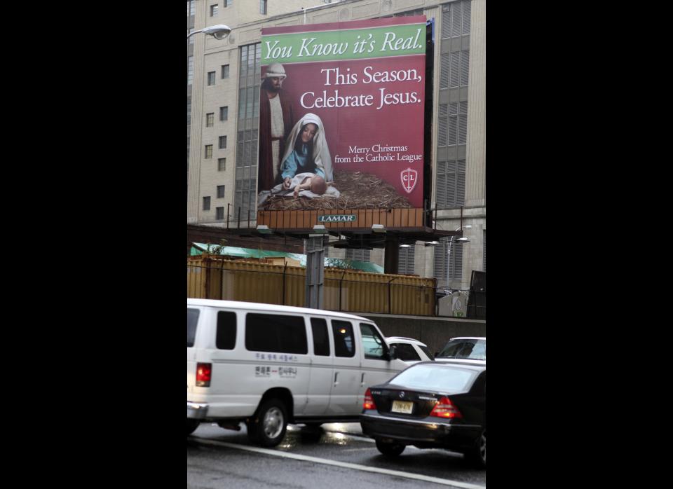 A billboard sponsored by a Catholic group is displayed near an exit of the Lincoln Tunnel in New York, Wednesday, Dec. 1, 2010. Similarly, a billboard sponsored by an atheist group is displayed near the tunnel's New Jersey entrance. (Seth Wenig, AP)