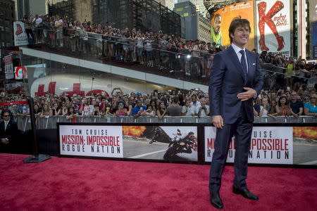 Actor Tom Cruise poses on the red carpet for a screening of the film "Mission Impossible: Rogue Nation" in New York July 27, 2015. REUTERS/Brendan McDermid