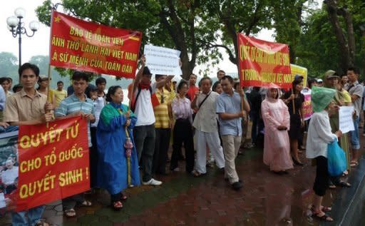 Protesters attend an anti-China rally in Hanoi, Vietnam, on August 21. At least eight political activists involved in recent protests have been arrested on subversion charges in a crackdown which began after the prime minister was re-appointed, their legal adviser said