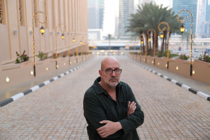 FILE PHOTO: Reuters journalist Michael George poses for a portrait in Dubai