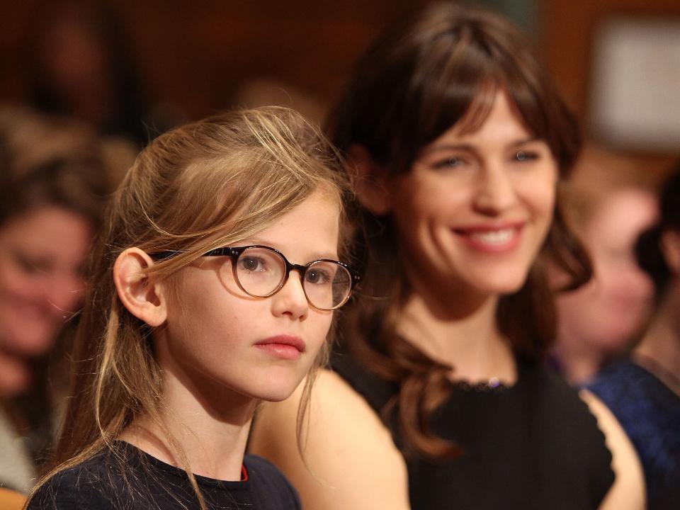 Jennifer Garner (R) and her daughter Violet Affleck listen to Ben Affleck testify before a Senate Appropriations State, Foreign Operations, and Related Programs Subcommittee hearing on "Diplomacy, Development, and National Security" on Capitol Hill in Washington March 26, 2015