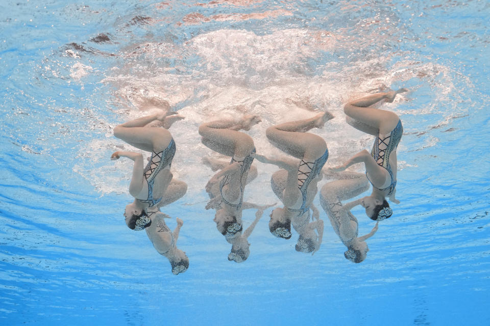 China team compete in the mixed team free final of artistic swimming at the World Aquatics Championships in Doha, Qatar, Friday, Feb. 9, 2024. (AP Photo/Lee Jin-man)