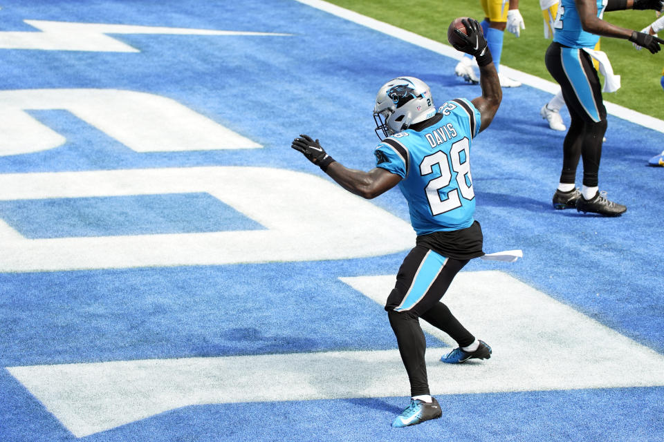 Carolina Panthers running back Mike Davis (28) celebrates after a touchdown catch against the Los Angeles Chargers during the first half of an NFL football game Sunday, Sept. 27, 2020, in Inglewood, Calif. (AP Photo/Ashley Landis )