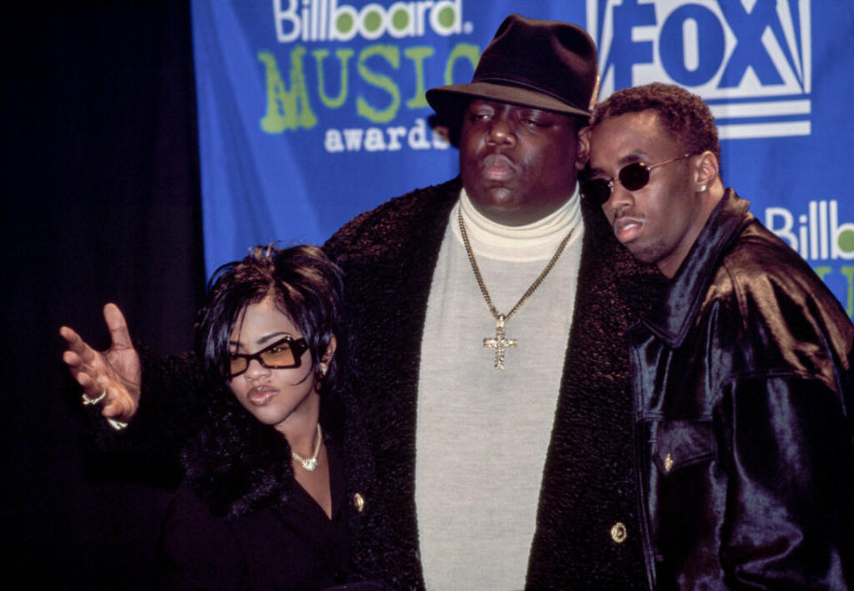 Lil Kim 90s pictured: Lil Kim, Biggie Smalls, and Diddy in the 90s