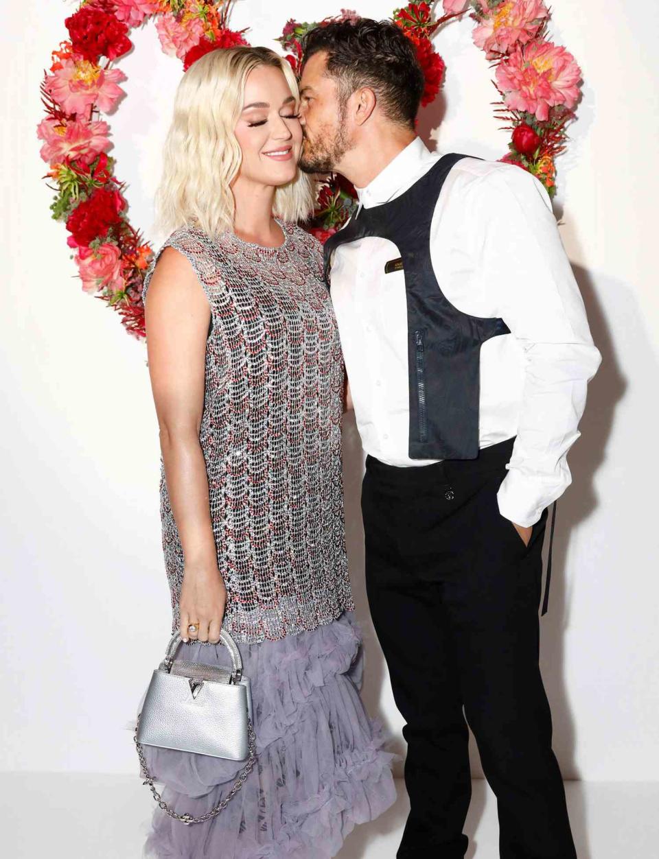 Katy Perry and Orlando Bloom attend the Louis Vuitton Parfum Dinner at Fondation Louis Vuitton at Fondation Louis Vuitton on July 05, 2021 in Paris, France