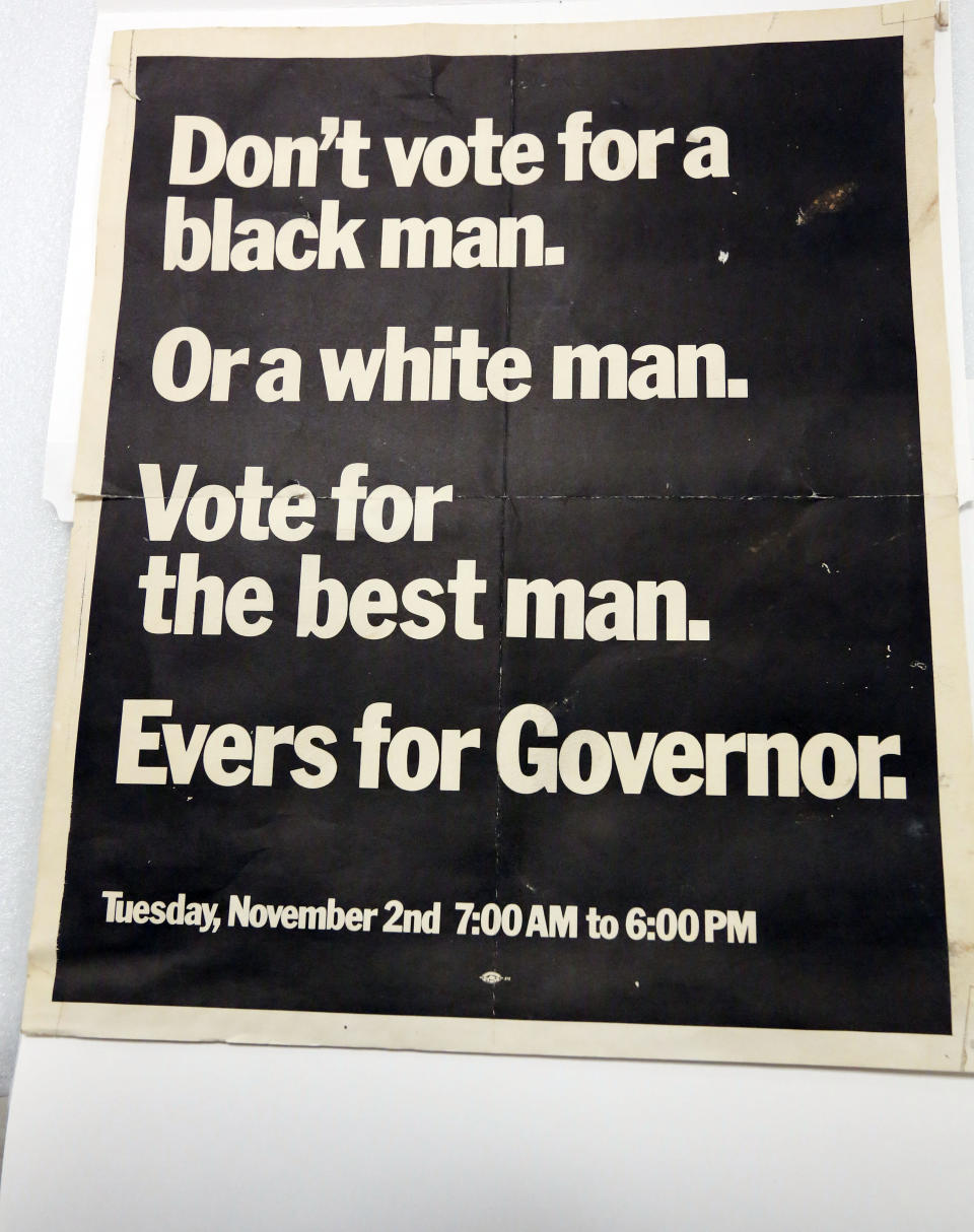 In this Oct. 11, 2013 photograph, items like this poster used by former Fayette, Miss., Mayor Charles Evers, brother of slain civil rights leader Medgar Evers, during his campaign for governor, will eventually be displayed in the state civil rights museum in Jackson, Miss. Officials say they did not set out to have separate-but-equal museums for the documentation of the state's history, but it could end up that way. Mississippi breaks ground Thursday. Oct. 24, 2013, on side-by-side museums that are expected to break ground of their own in how they depict the Southern state once rocked by racial turmoil. (AP Photo/Rogelio V. Solis)