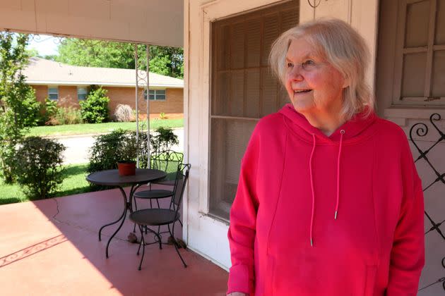 Linda Coffee stands outside her Texas home in 2022.