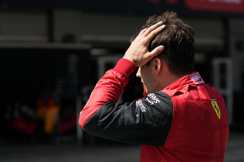 Ferrari driver Charles Leclerc of Monaco gestures at the pit lane after his car's breakdown during the Spanish Formula One Grand Prix at the Barcelona Catalunya racetrack in Montmelo, Spain, Sunday, May 22, 2022. (AP Photo/Pool/Manu Fernandez)