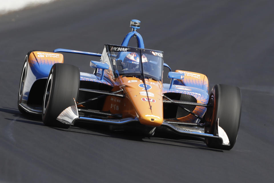 Scott Dixon, of New Zealand, drives into turn one during the Aeroscreen testing at Indianapolis Motor Speedway, Wednesday, Oct. 2, 2019, in Indianapolis. (AP Photo/Darron Cummings)