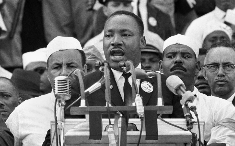 Martin Luther King Jr, head of the Southern Christian Leadership Conference, addresses marchers during his "I Have a Dream" speech at the Lincoln Memorial in Washington - AP