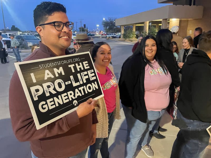 Anti-abortion activists rally ahead of a city commission meeting in Hobbs