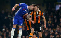 <p>Ryan Mason and Gary Cahill go for an aerial challenge </p>