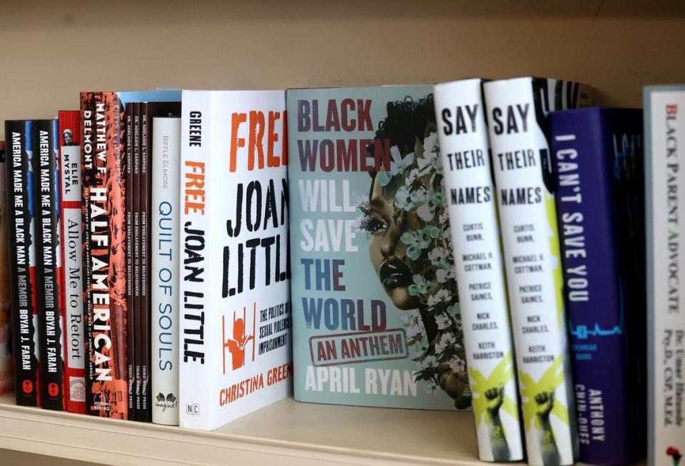 Books line the shelves of The Dock Booskshop in east Fort Worth on Friday, May 3, 2023. The book store is owned by sisters Donya and Donna Craddock and is the largest full-service Black-owned bookstores in Texas and the Southwest.