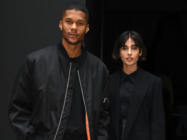 <p>David Fisher/Shutterstock</p> Naomi Scott and her husband Jordan Spence at the Chloe Spring Summer 2023 show during Paris Fashion Week on September 29, 2022