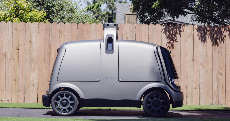 This undated image provided by The Kroger Co. shows an autonomous vehicle called the R1. Nuro and grocery chain Kroger are teaming up to bring unmanned delivery service to customers. The companies said Tuesday, Dec. 18, 2018, that Nuro's unmanned vehicle, the R1, will be added to a fleet of autonomous Prius vehicles that have run self-driving grocery delivery service in Scottsdale, Ariz., with vehicle operators since August. (Andrew Brown/The Kroger Co. via AP)