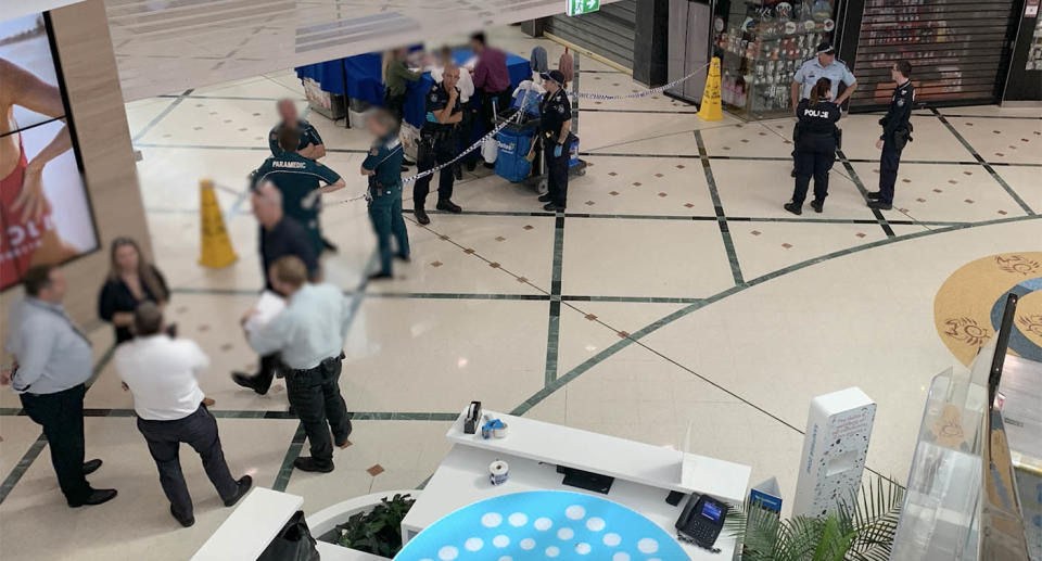 Police and emergency services gather at Cairns Central Shopping Centre after the attack. Source: QPS